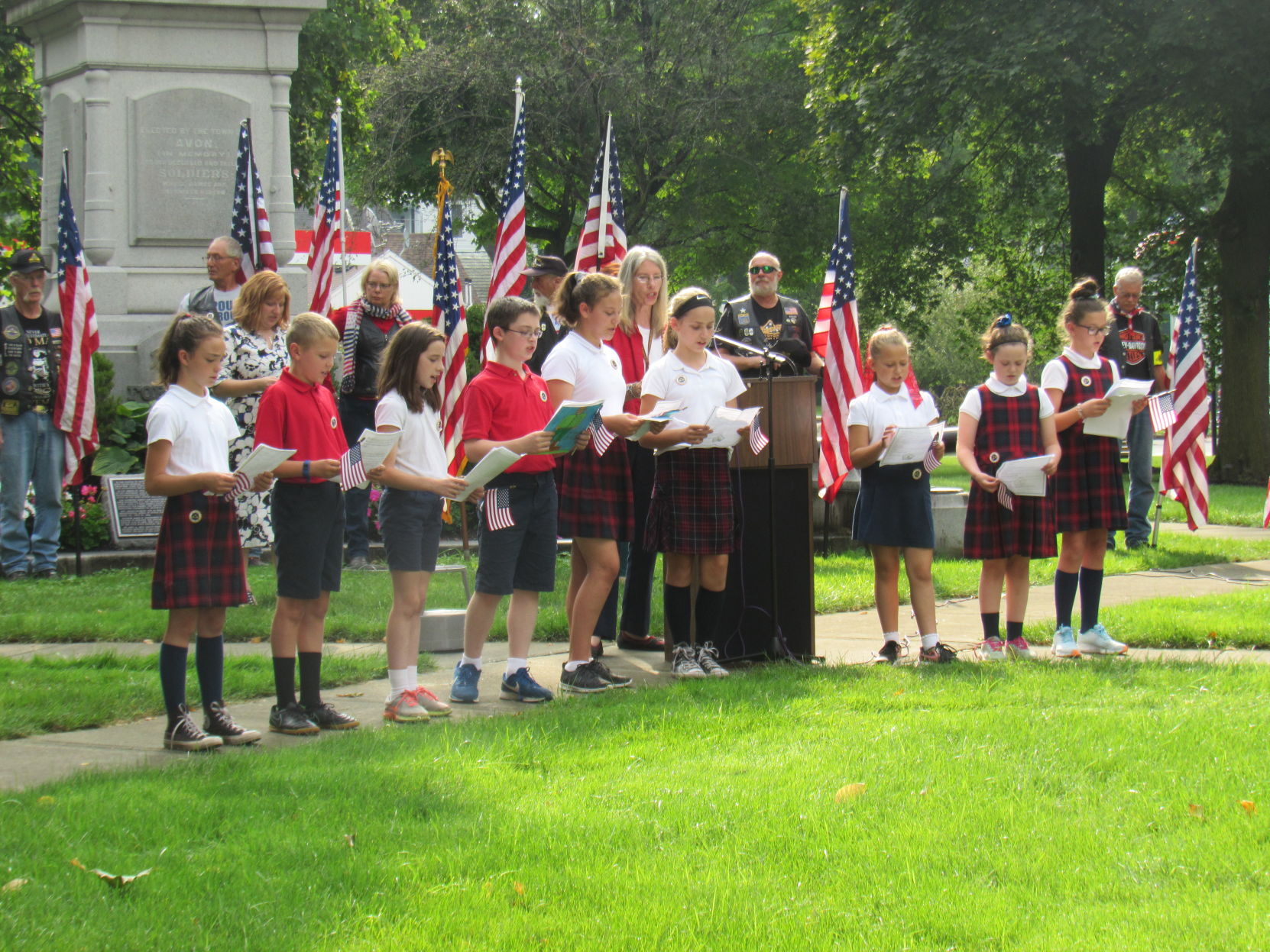 5th and 6th graders say a prayer.